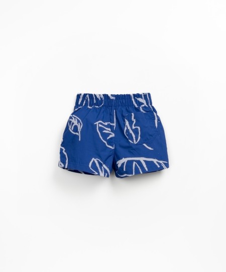 Swim shorts with leaf print