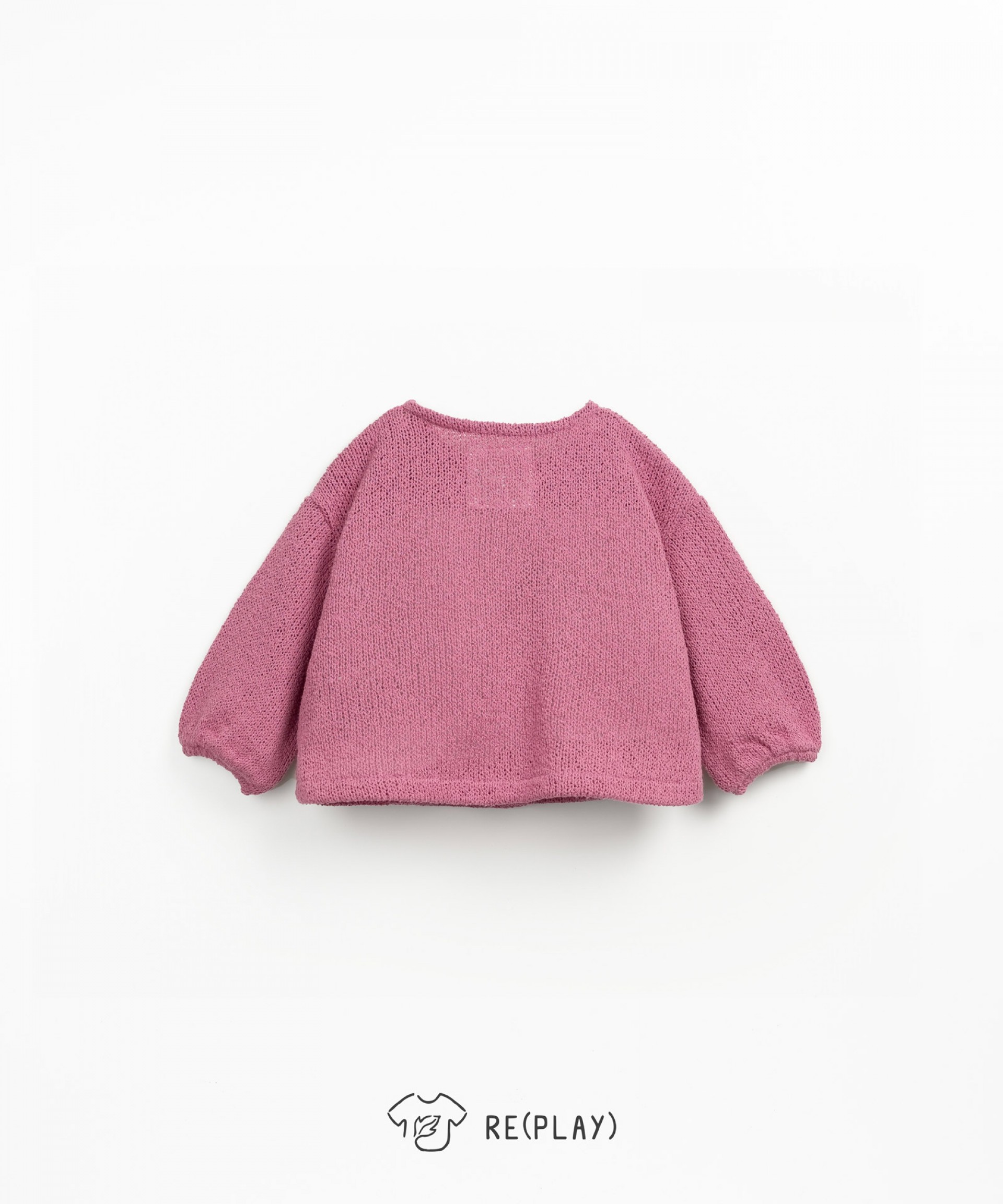Knitted jacket with coconut buttons