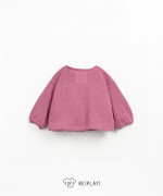 Knitted jacket with coconut buttons
