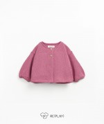 Knitted jacket with coconut buttons