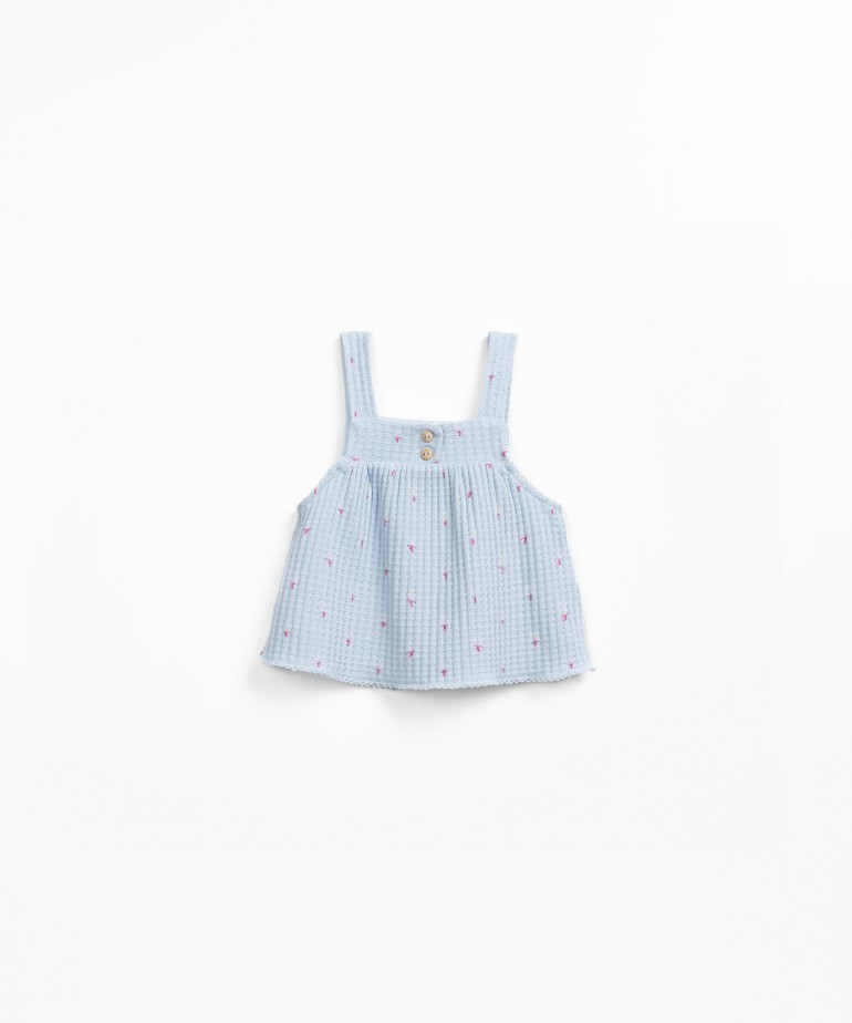 Floral knit top with coconut buttons