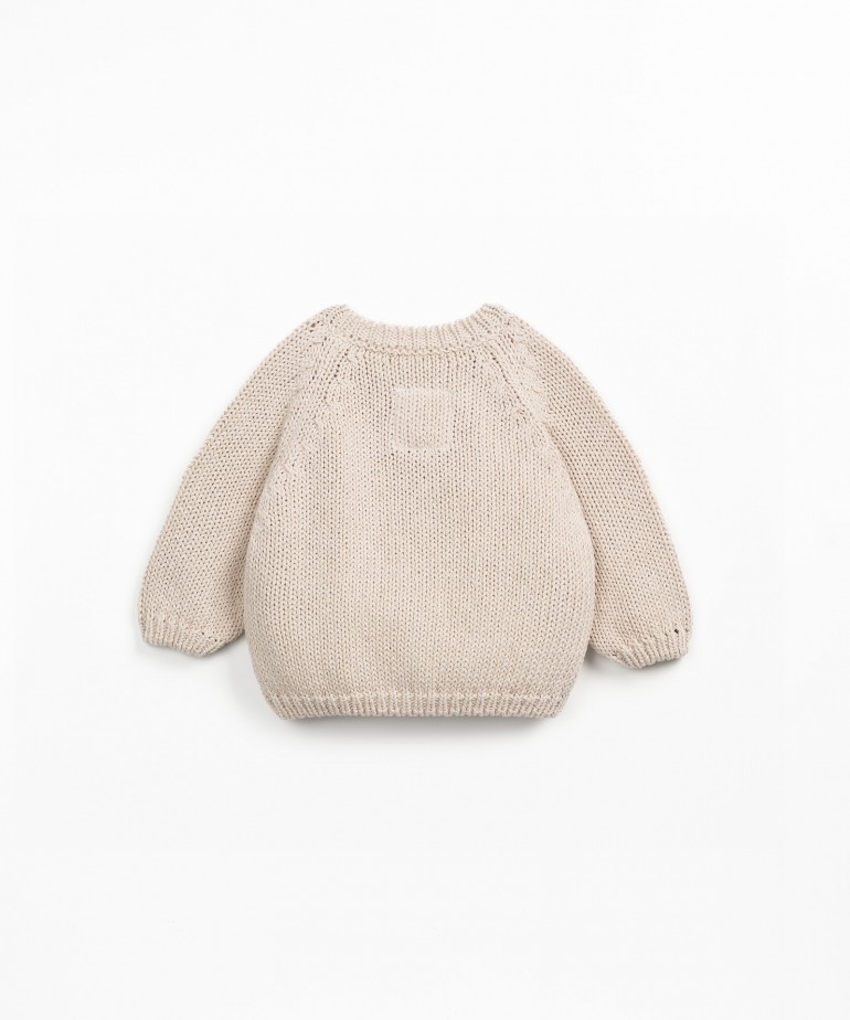 Knitted jacket with wooden buttons