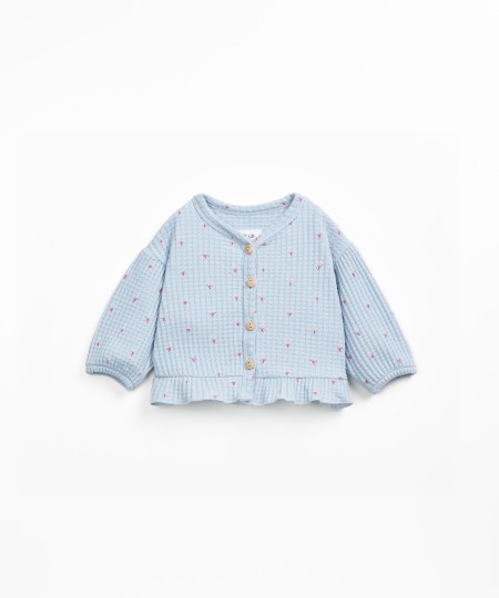 Veste en maille texturée avec motif