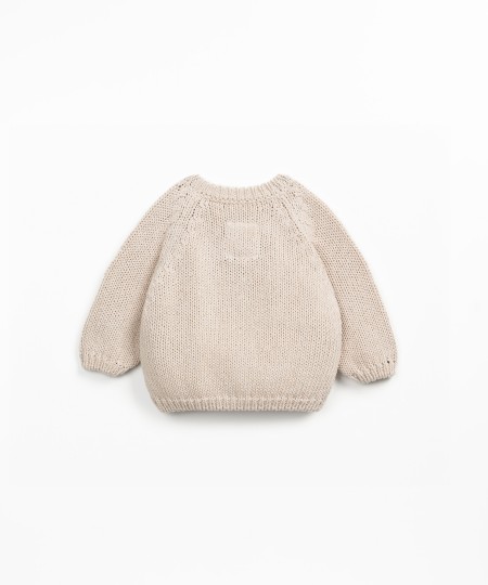 Veste en tricot avec boutons en bois