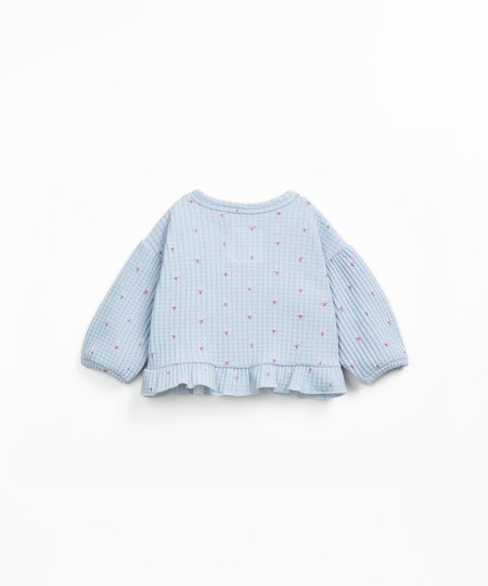 Veste en maille texturée avec motif