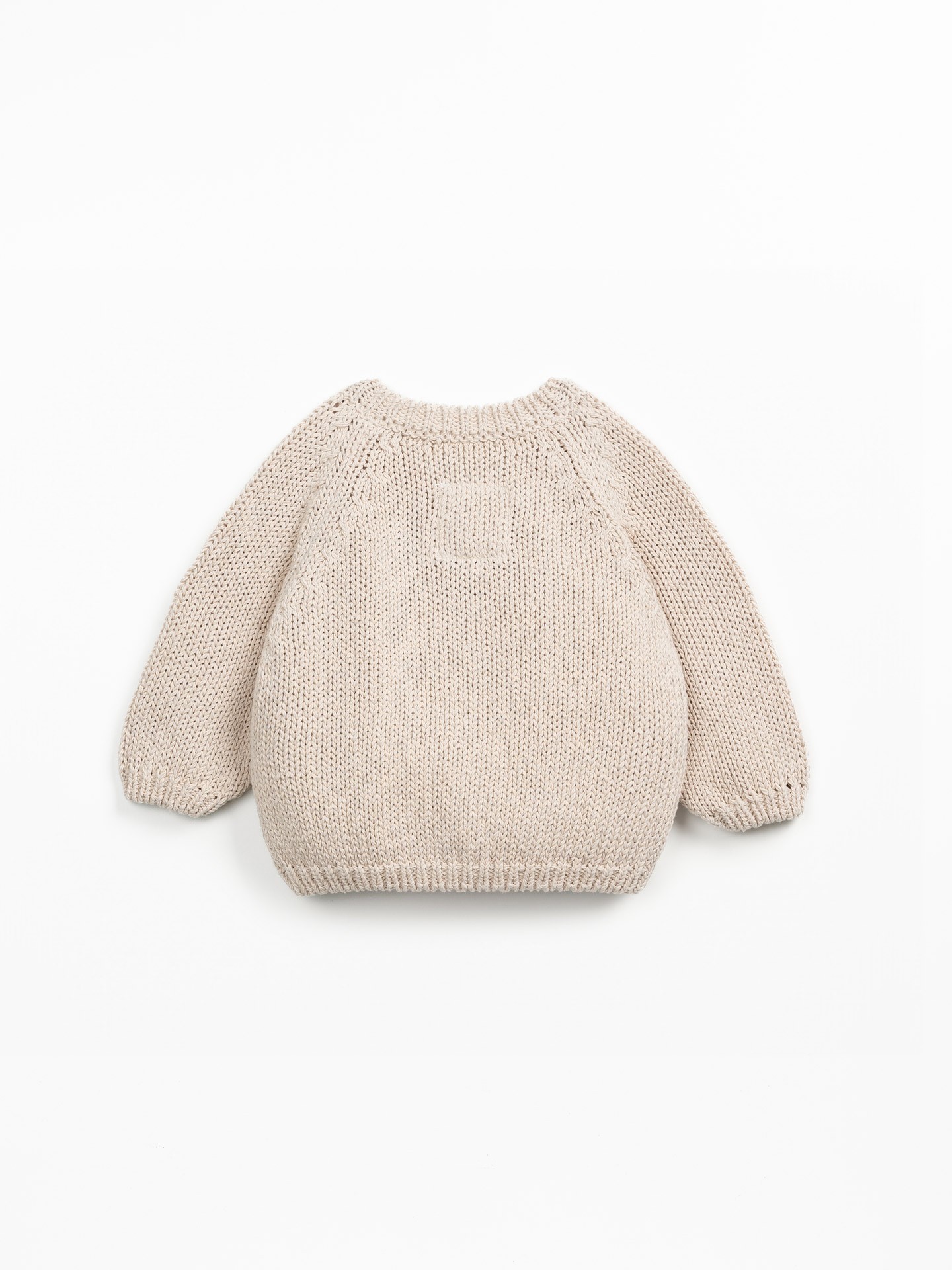 Veste en tricot avec boutons en bois