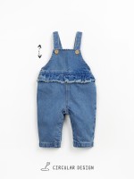 Combinaison en denim avec boutons en coco