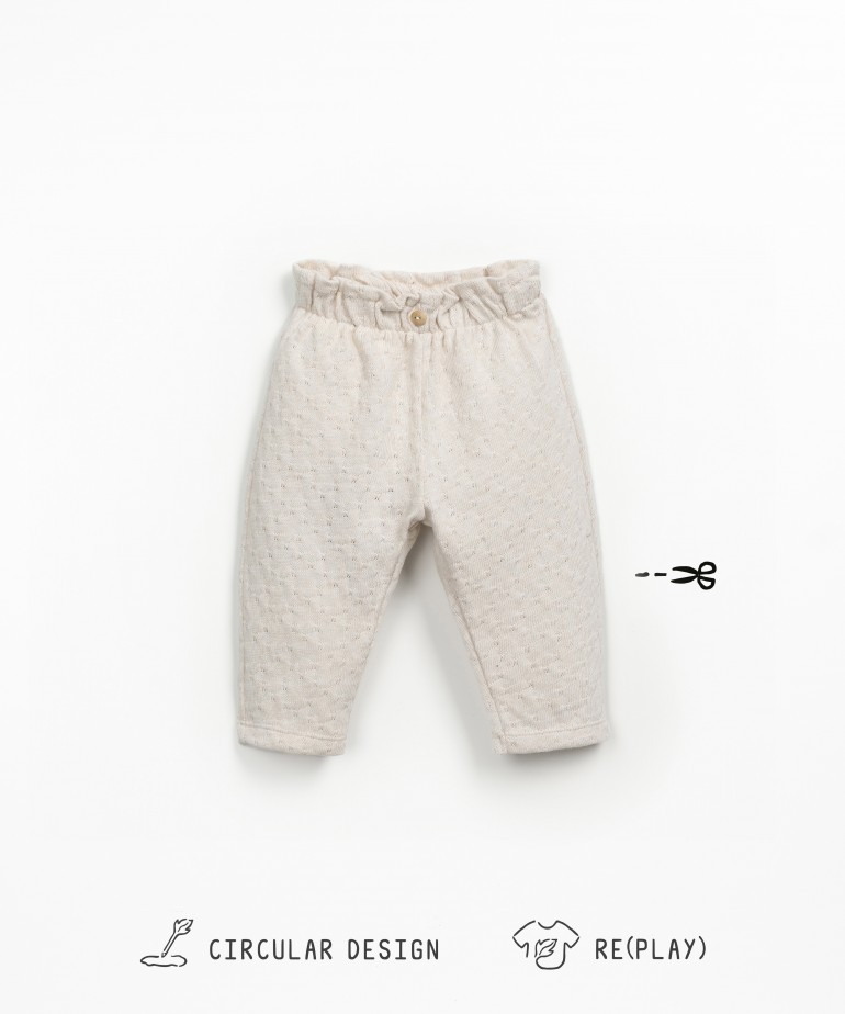 Jersey trousers with texture in regenerative and recycled cotton