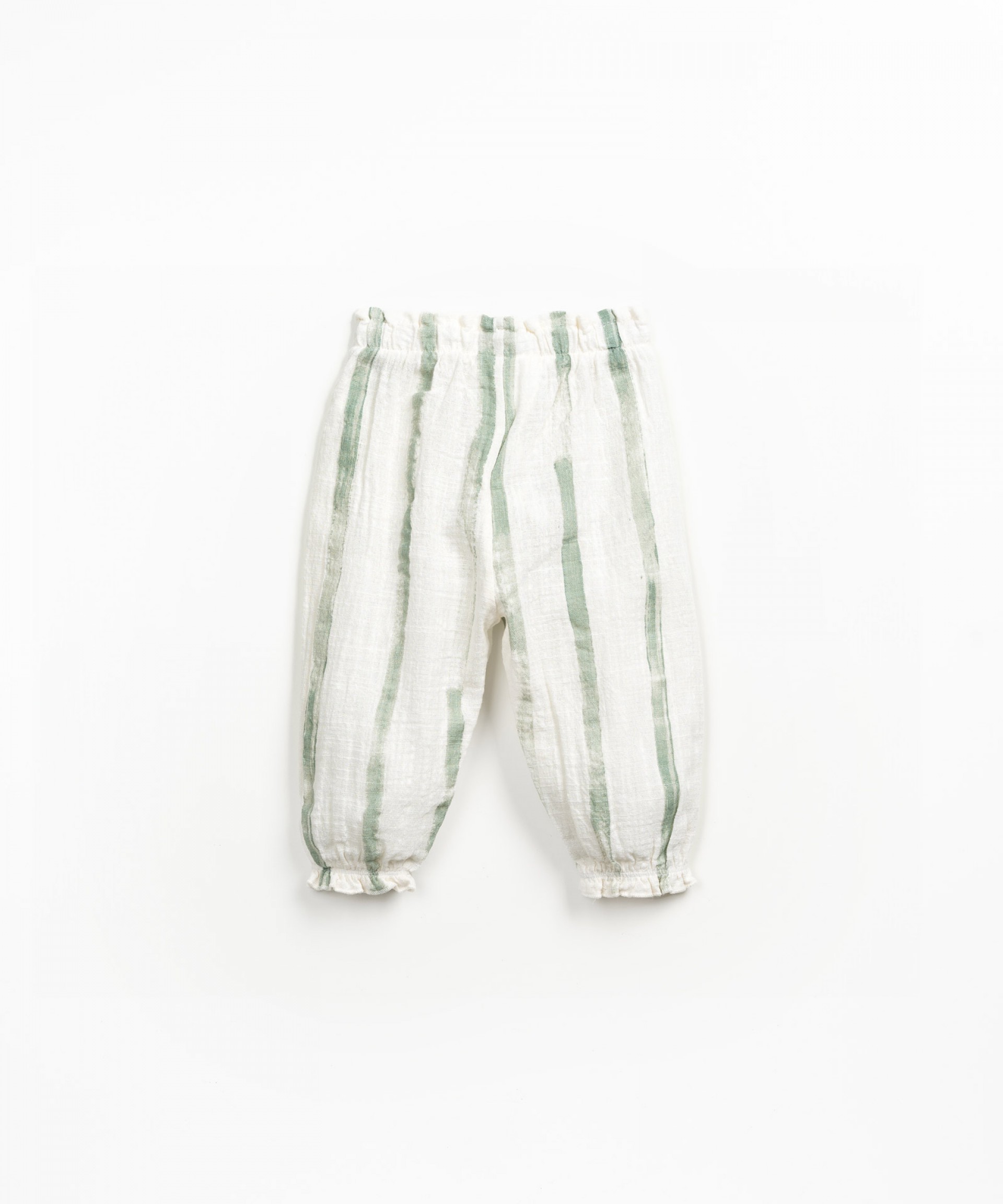 Trousers with decorative drawstring