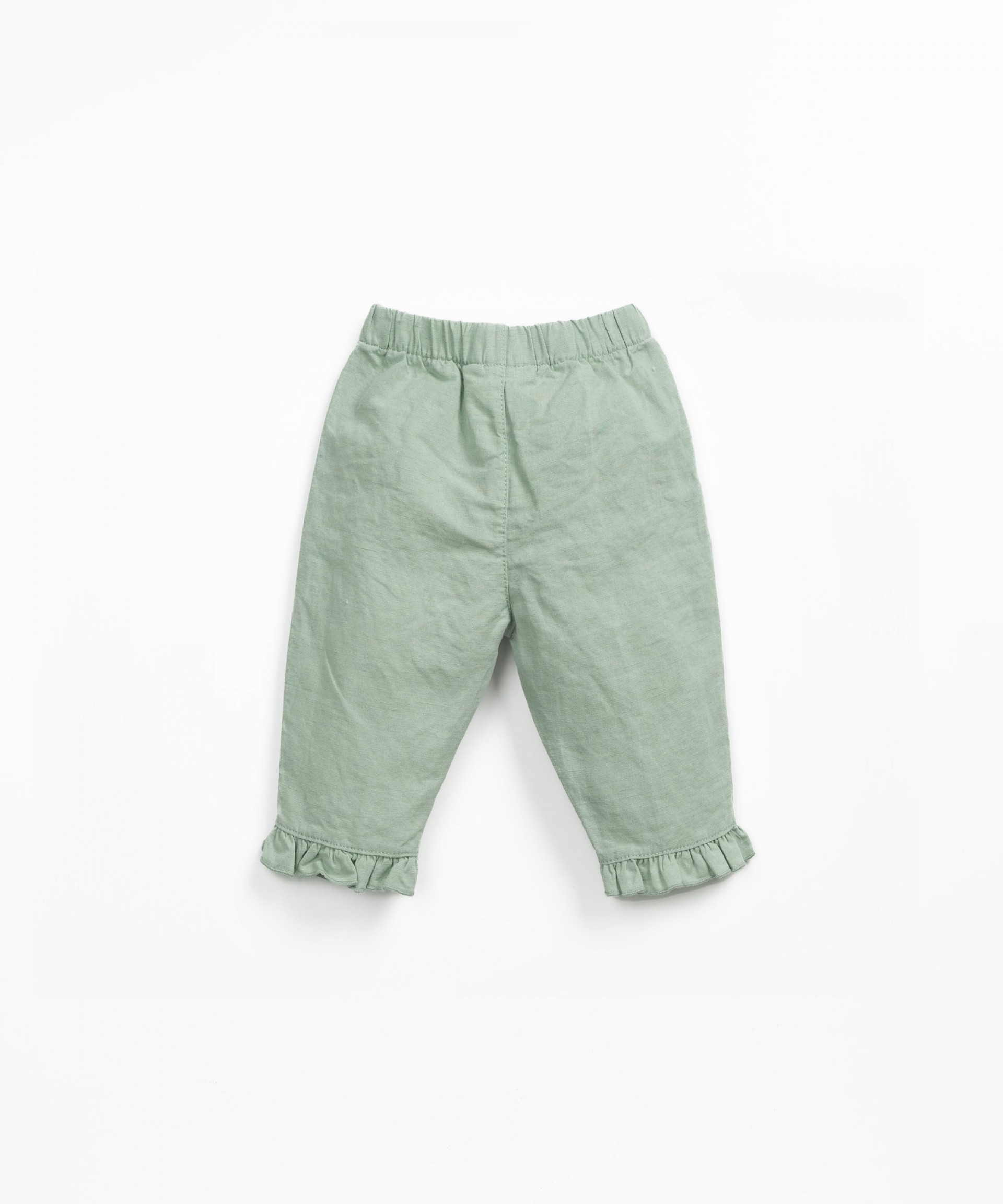 Trousers with frill detail
