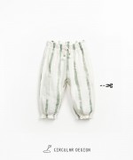 Trousers with decorative drawstring