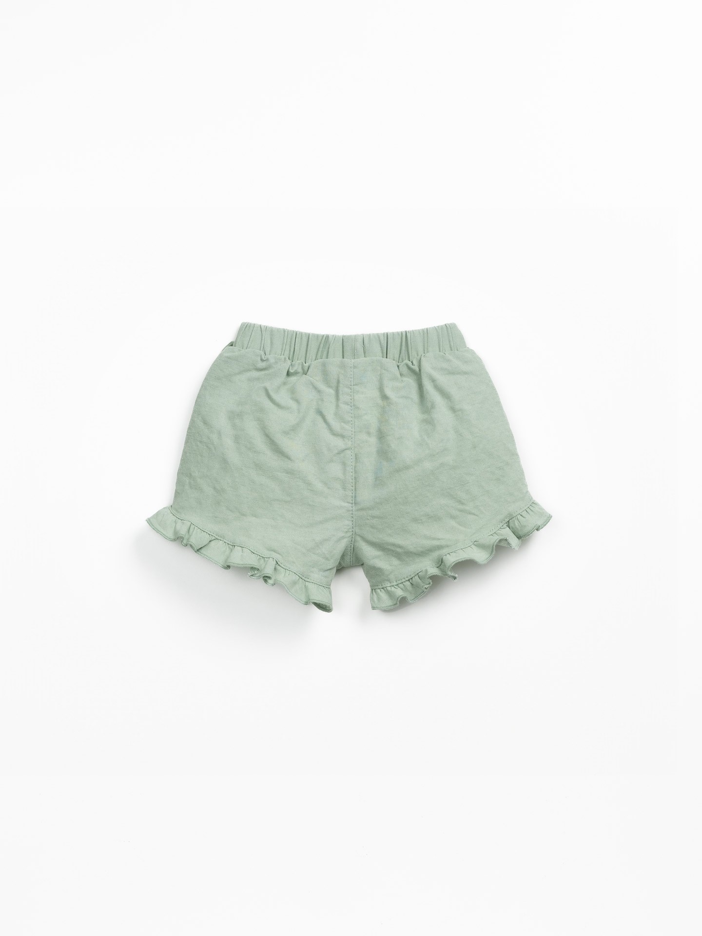 Pantalón corto de tela con insertos laterales