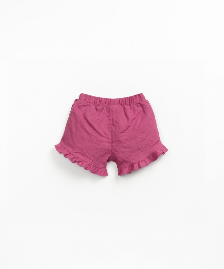 Pantaln corto de tela con inserciones laterales