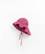 Fabric hat with asymmetric brim