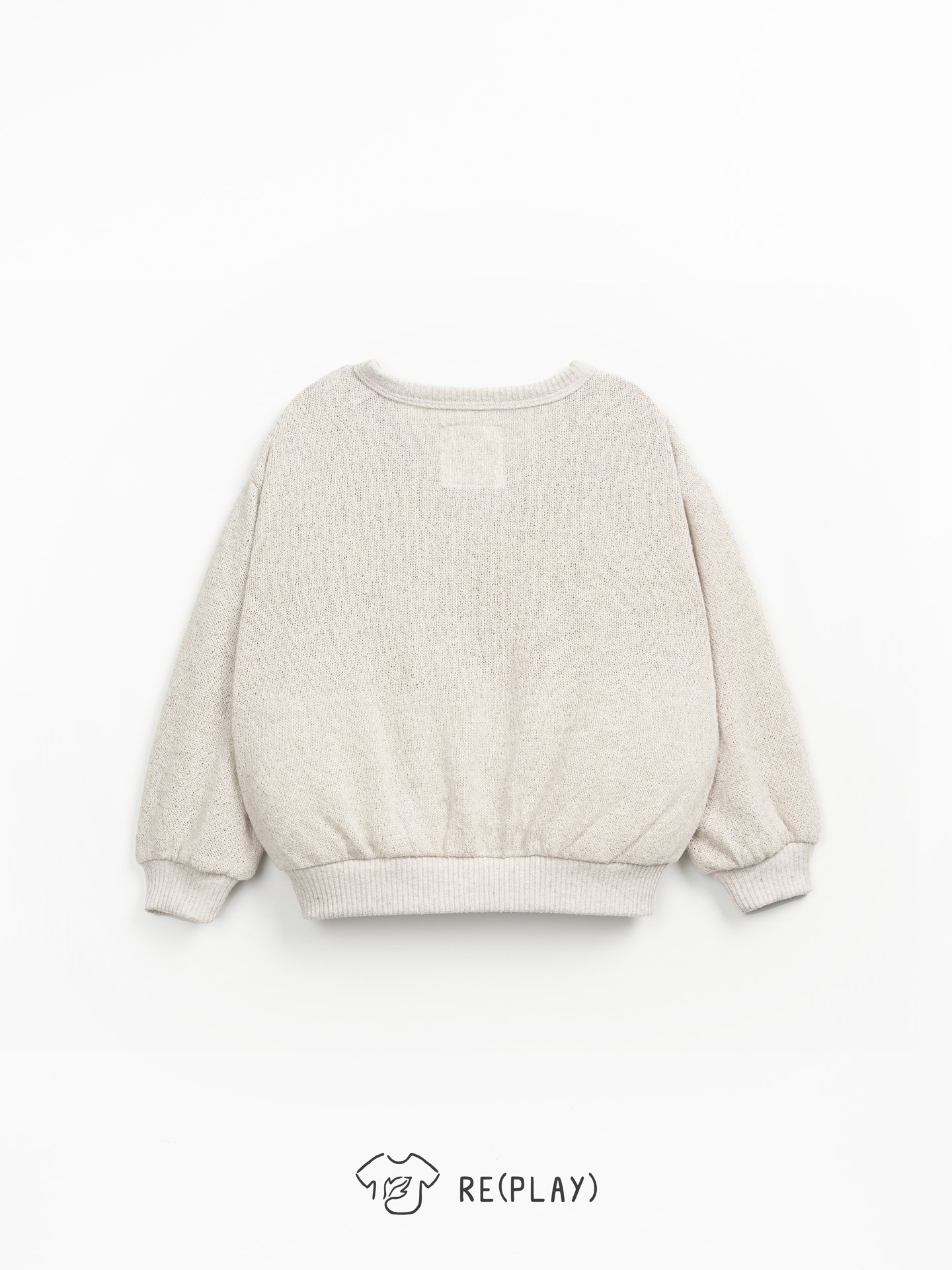 Veste en maille avec des boutons en coco