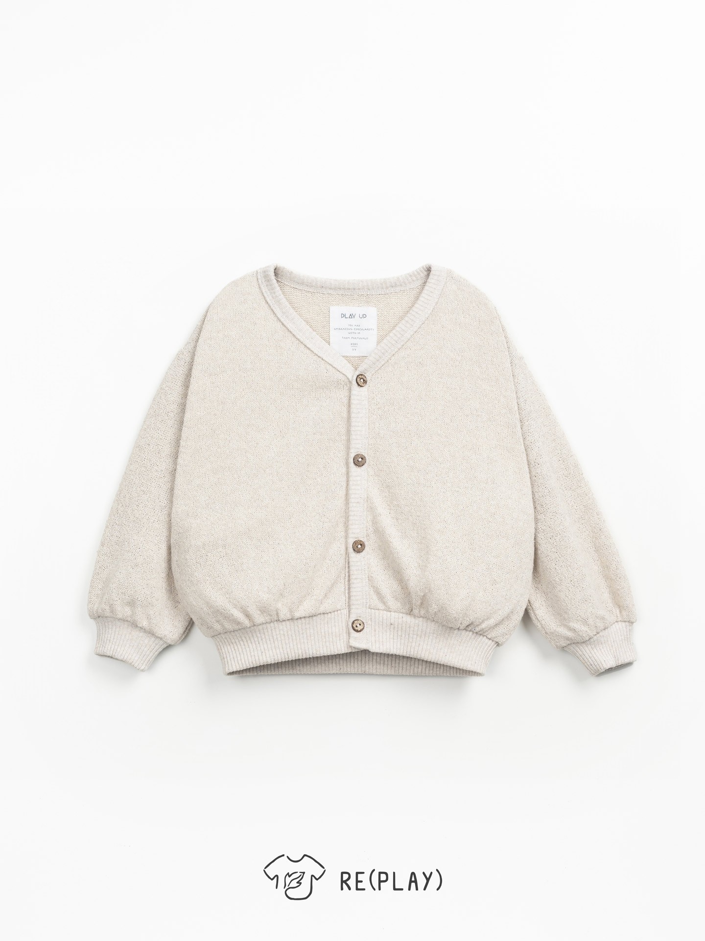 Veste en maille avec des boutons en coco