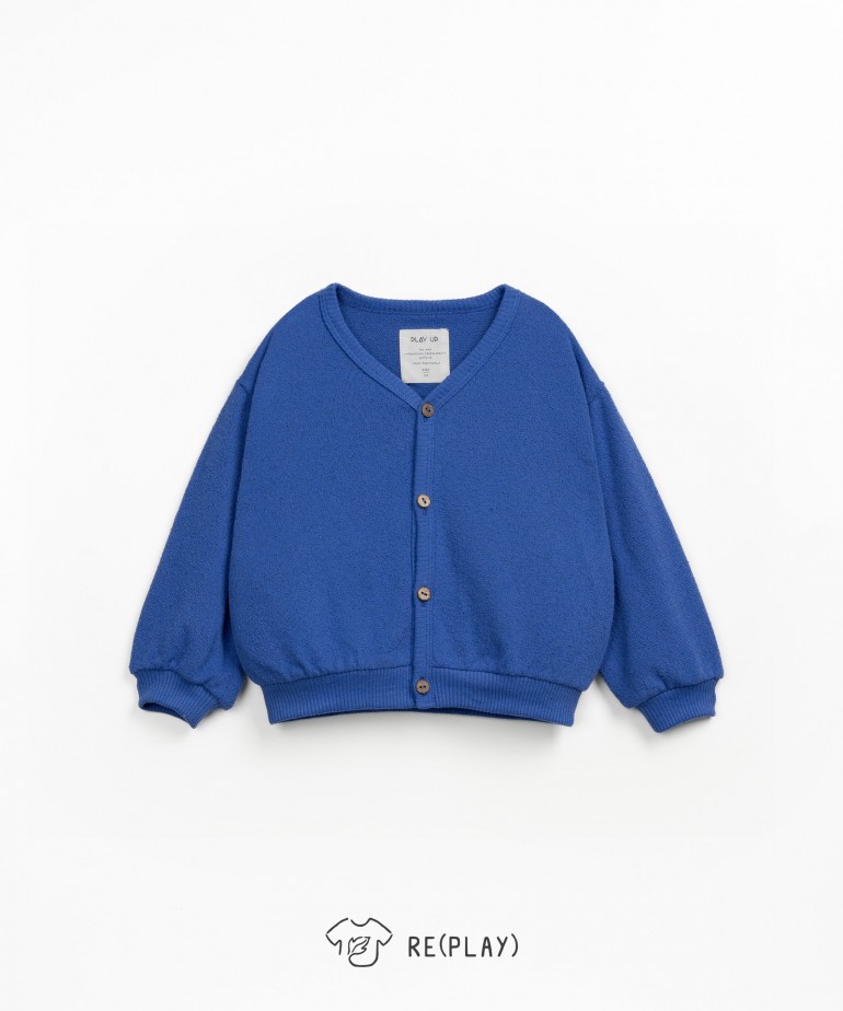 Coat in a blend of cotton and recycled fibers with puff sleeve