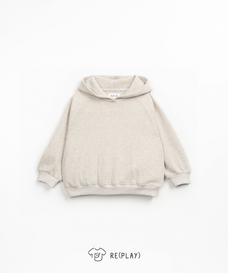 Knit sweatshirt with hood and coconut buttons