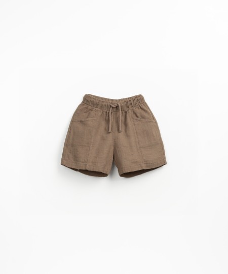Fabric shorts with adjustable drawstring