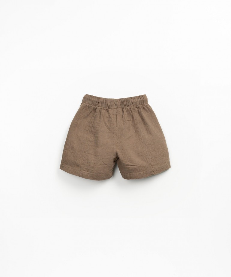 Fabric shorts with adjustable drawstring