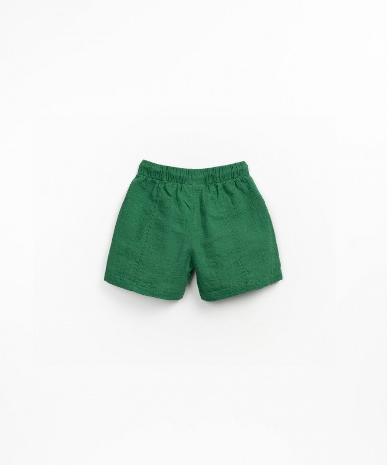 Fabric shorts with adjustable drawstring