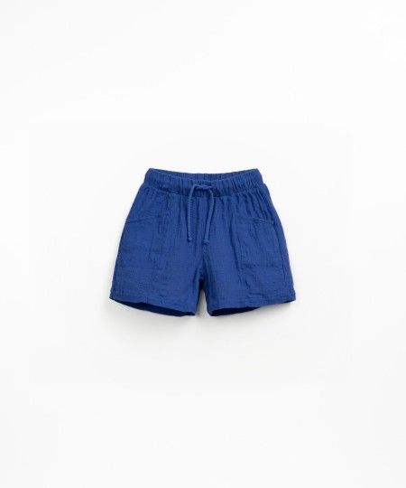 Fabric shorts with adjustable drawstring