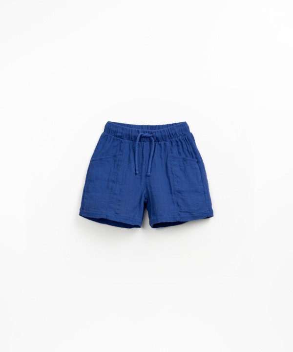 Fabric shorts with adjustable drawstring