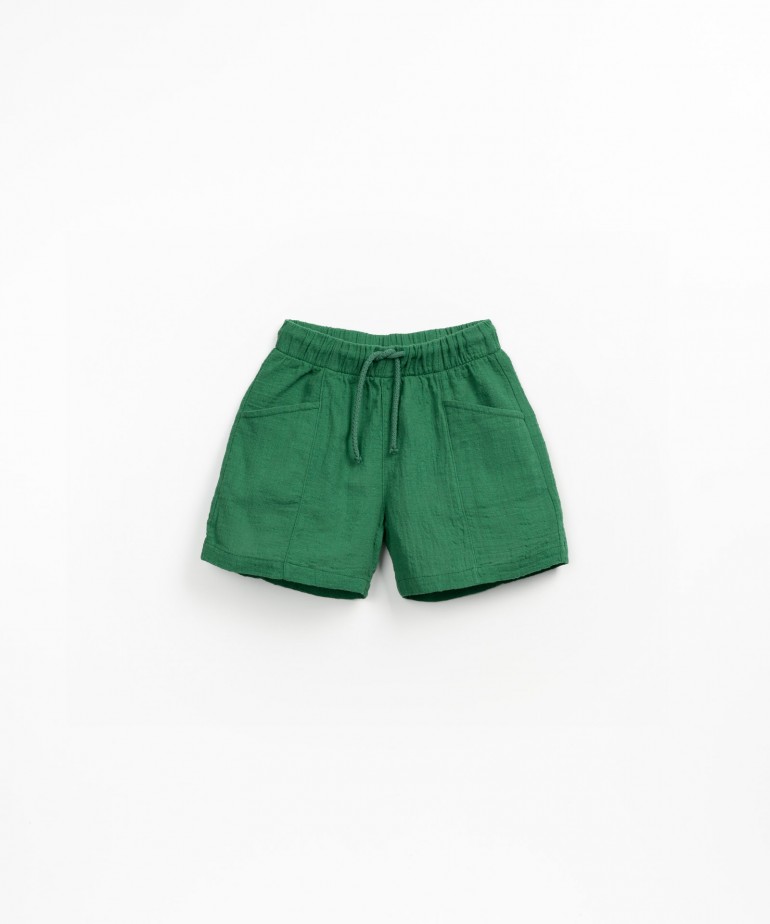 Fabric shorts with adjustable drawstring