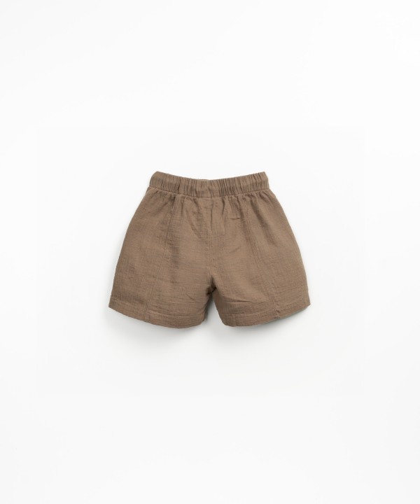 Fabric shorts with adjustable drawstring