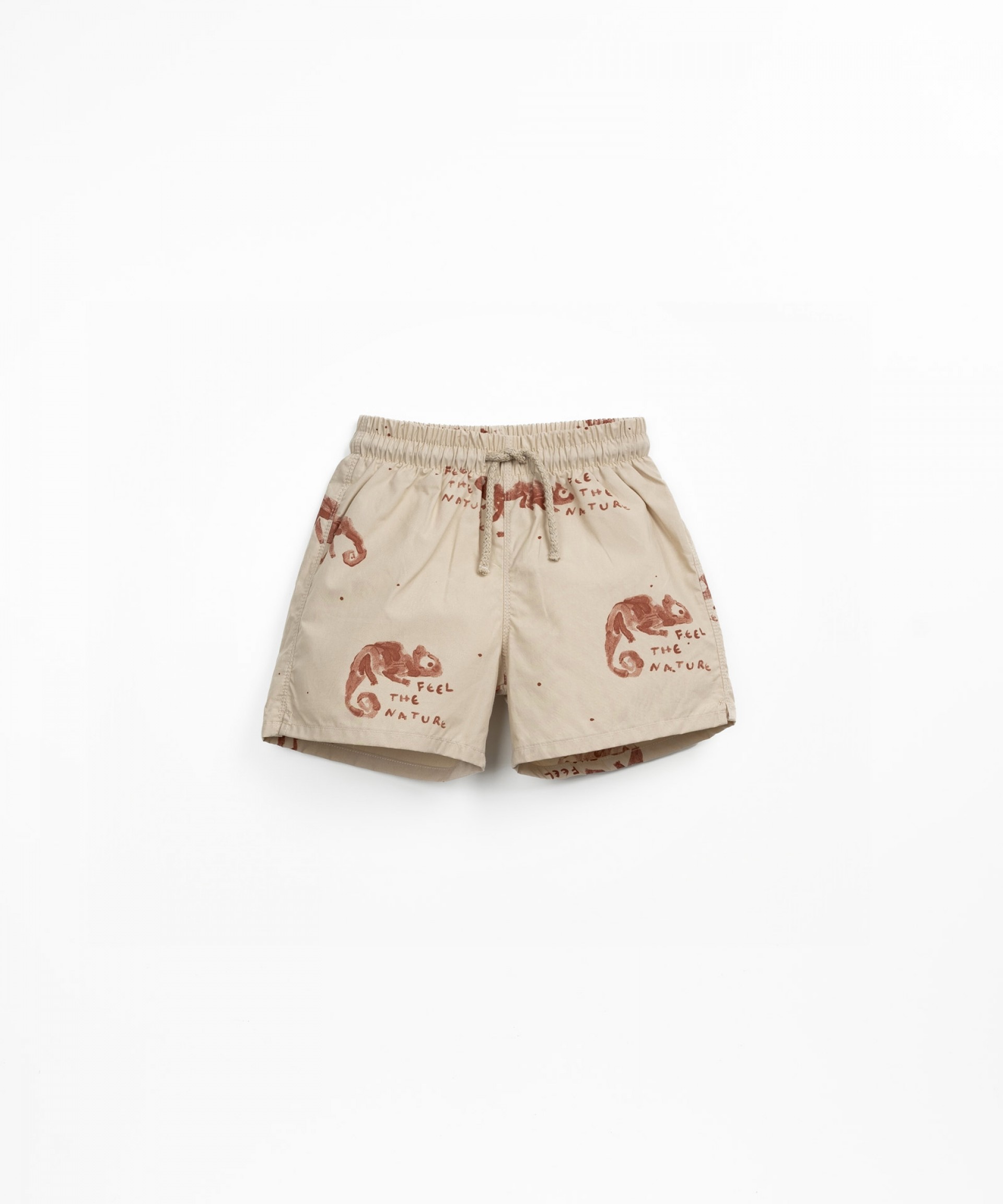Swim shorts with chameleon print