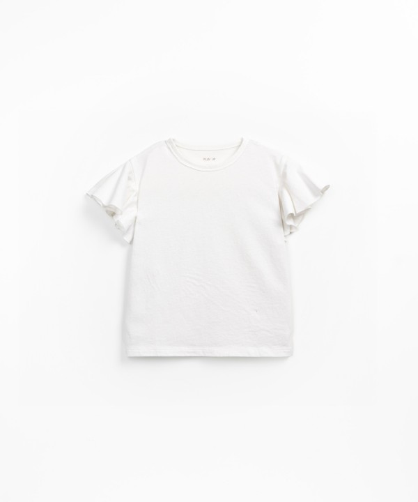 T-shirt con volant sulla manica