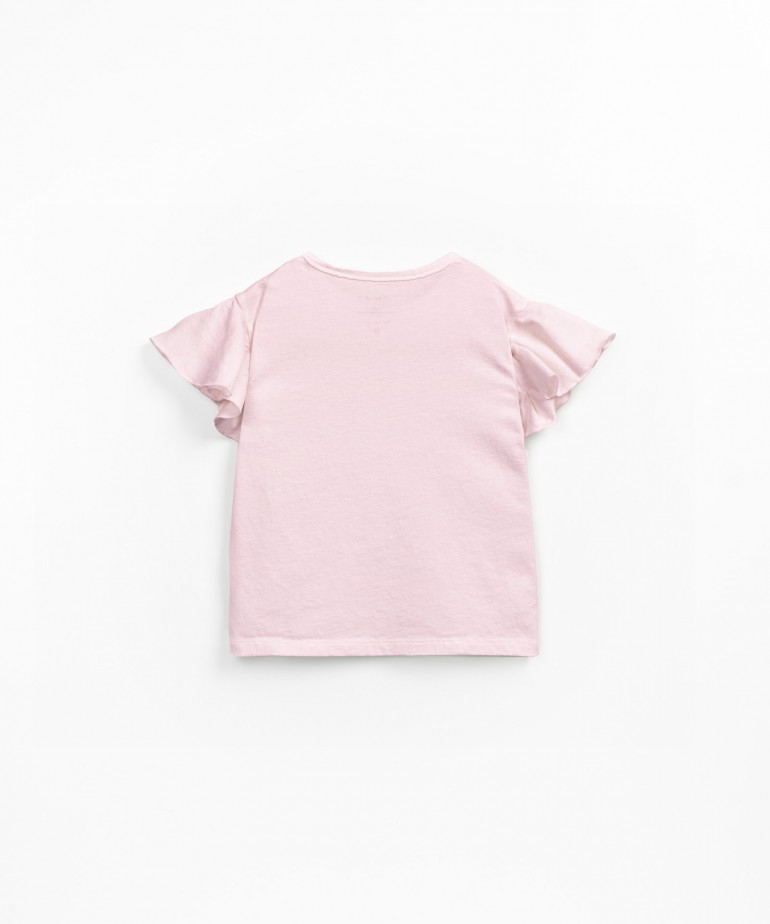 T-shirt con volant sulla manica