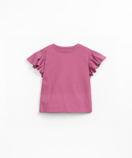 T-shirt con volant sulla manica
