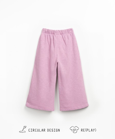 Calça mistura de fibras naturais e recicladas com cordão decorativo