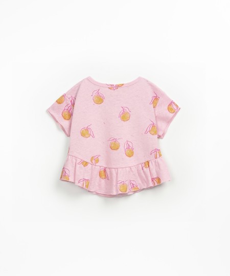 T-shirt con balza sul fondo