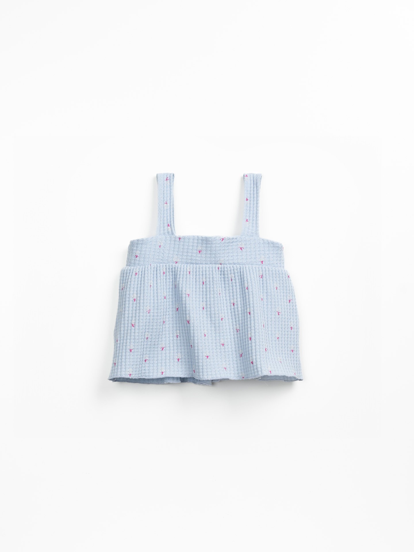 Top de punto texturizado con estampado de alcachofas