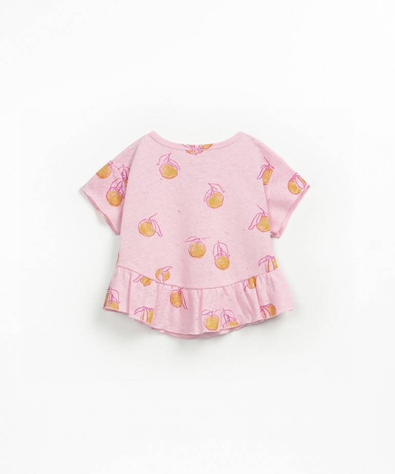 T-shirt con balza sul fondo