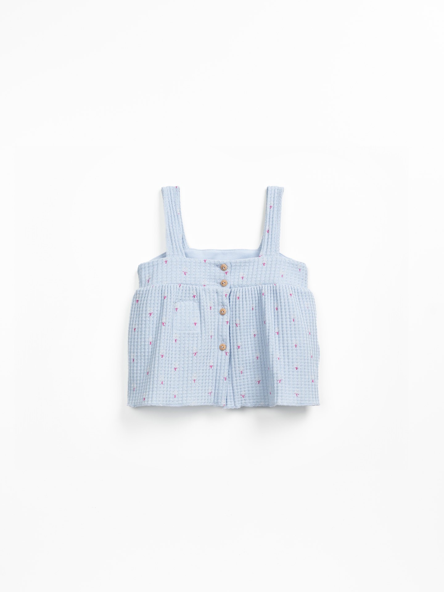 Top de punto texturizado con estampado de alcachofas