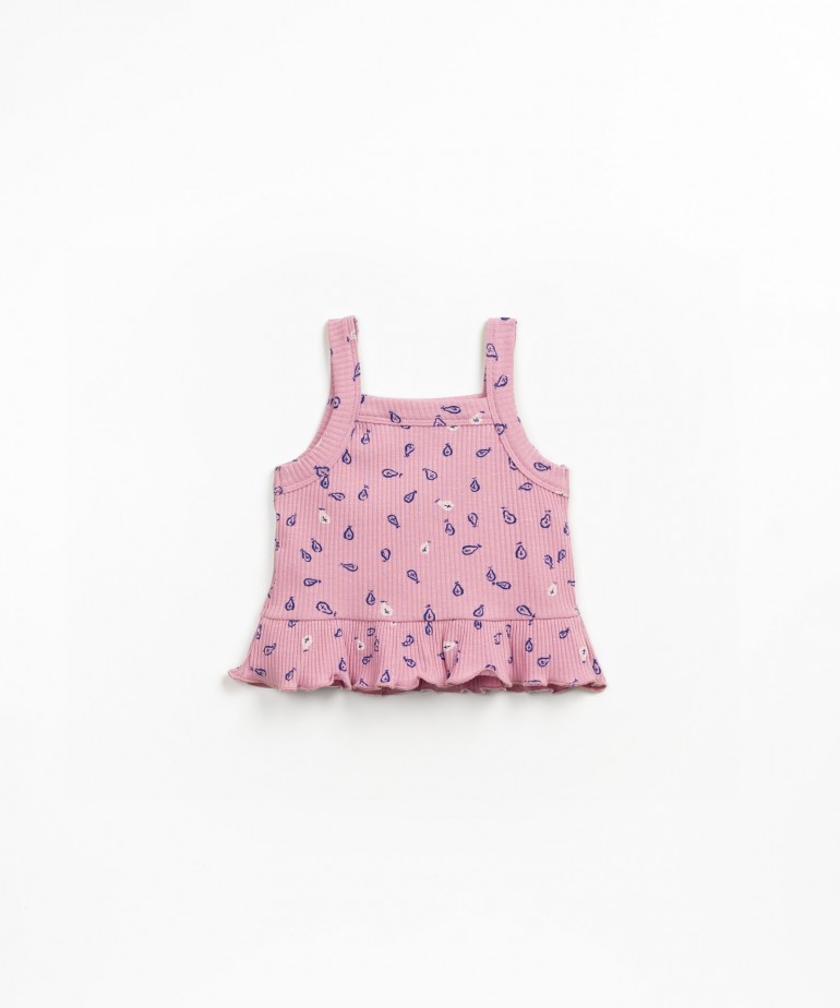 Top in maglia con bottoni decorativi in legno