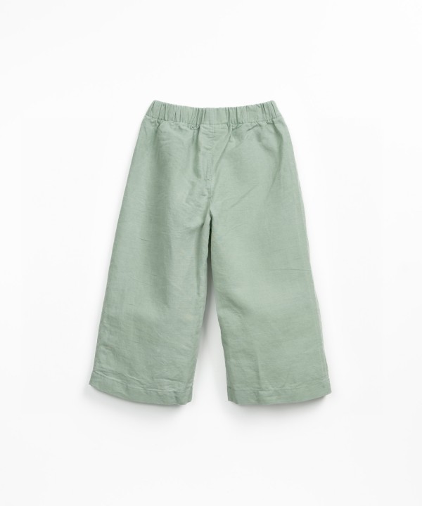 Linen and organic cotton trousers with decorative drawstring