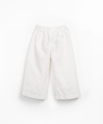 Fabric trousers with decorative drawstring