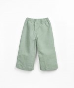 Fabric trousers with decorative drawstring