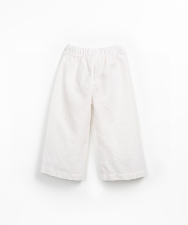 Linen and organic cotton trousers with decorative drawstring