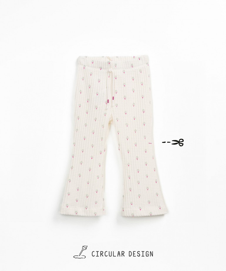 Trousers in recycled blend with floral pattern