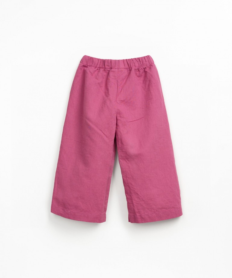 Linen and organic cotton trousers with decorative drawstring