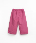 Fabric trousers with decorative drawstring