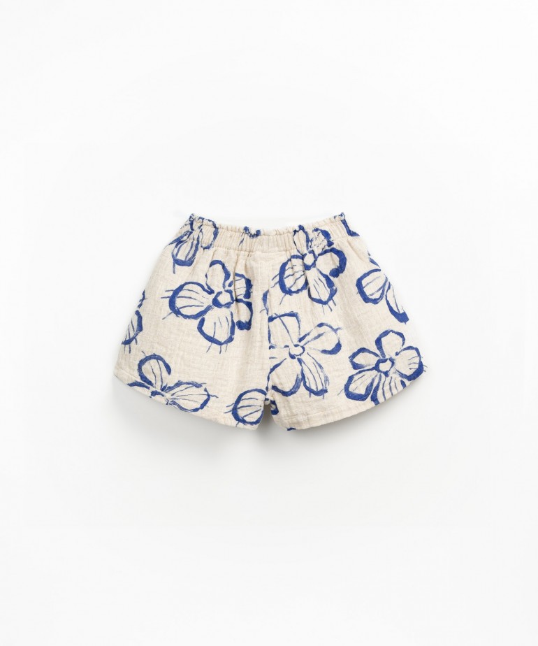 Pantaln corto de tejido con bolsillos