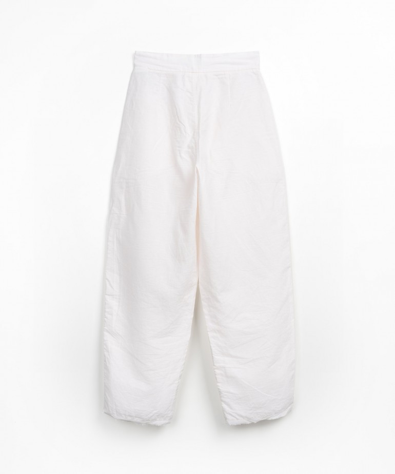 Pantaloni in lino con dettaglio sfrangiato