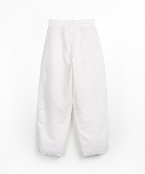 Linen trousers with frayed detail