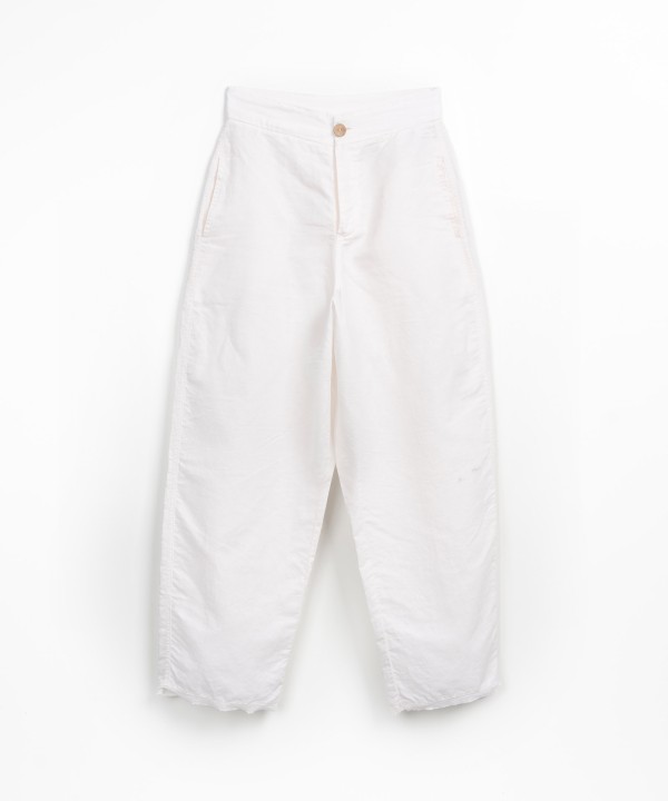 Linen trousers with frayed detail